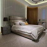 Warm Taupe Upholstered Bed with Tiered Headboard, Lacing Detail & Stainless Steel Accents